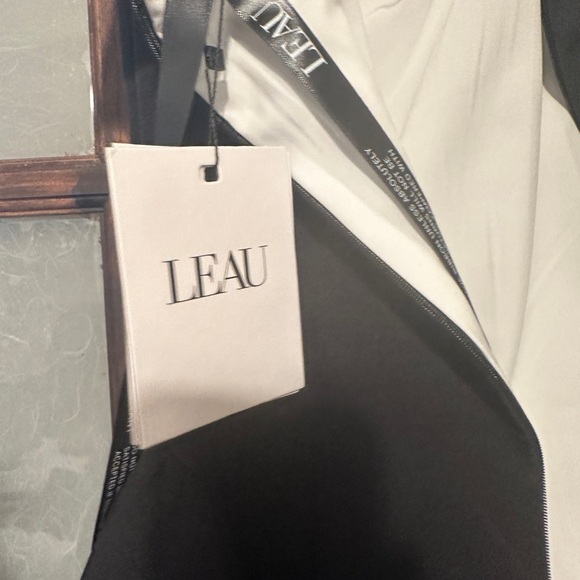 Black and white mini dress that flares at the hip. Size US small. NWT - Picture 6 of 8